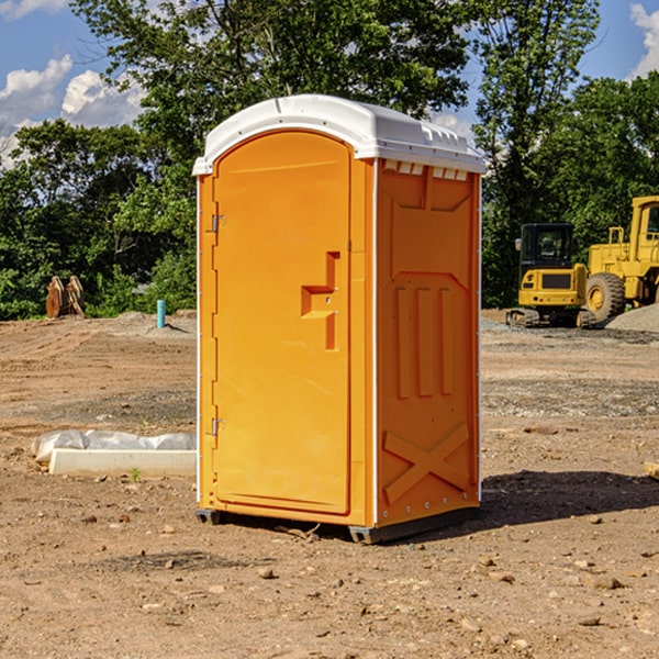 how often are the portable restrooms cleaned and serviced during a rental period in Milton Mills